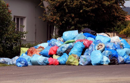 Professional rubbish clearance team working in a South West London neighborhood